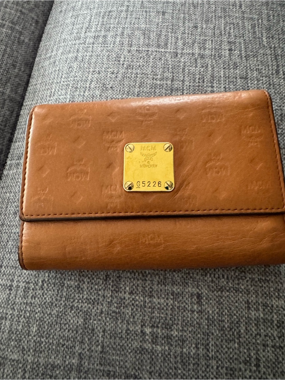 MCM Cognac Embossed Leather Wallet with Gold Plate